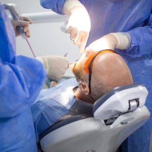 Oral surgery in progress in a dental hospital.